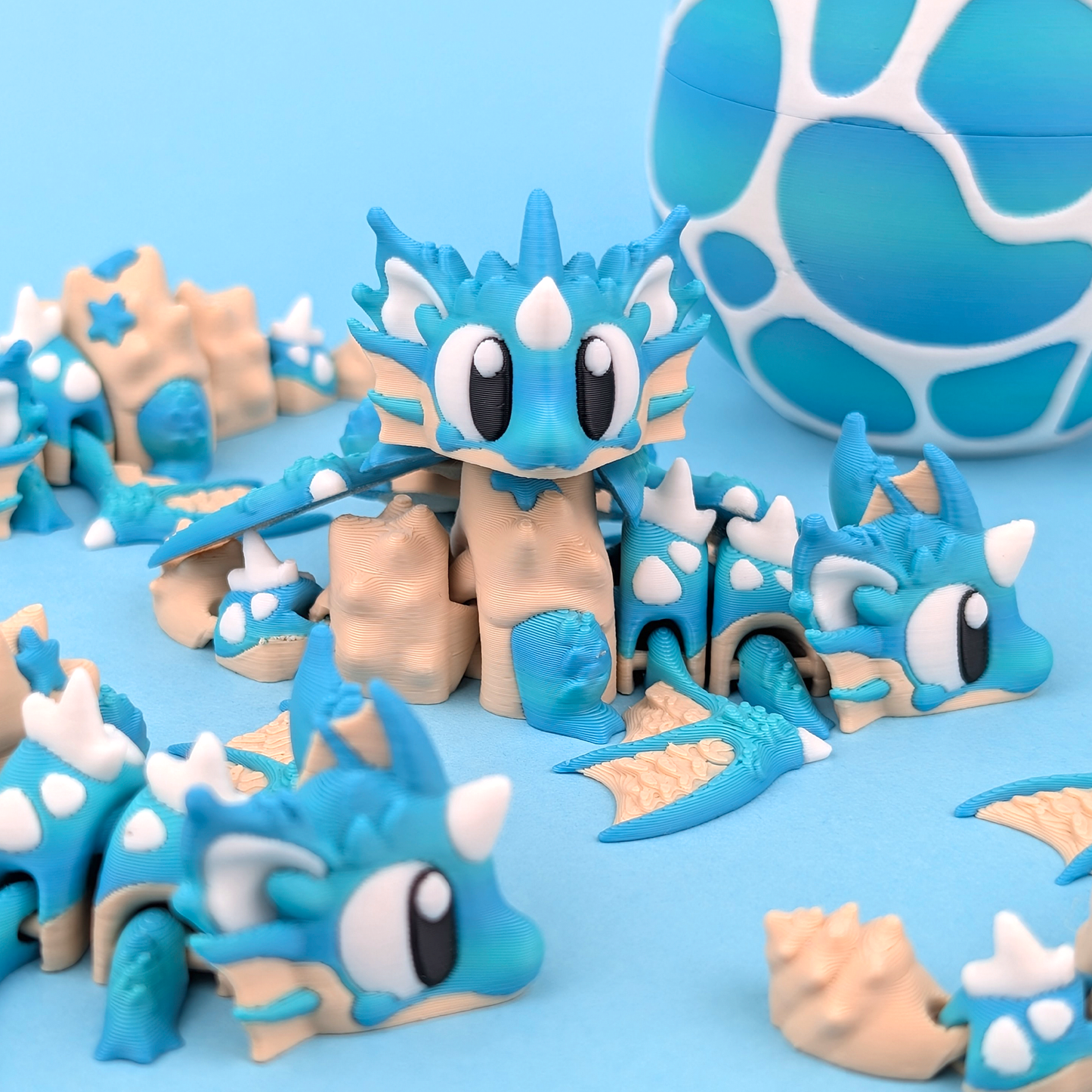 Sea Shell Dragon 3D printed articulated flexi dragon fidget toy (desk pet), seashell scales, side view, FlexiFriends3D