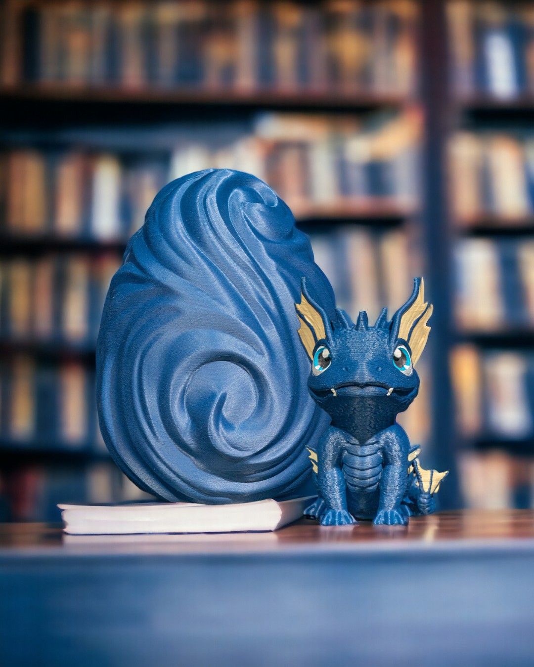 3D printed water dragon figure with egg – desk decor lifestyle photo