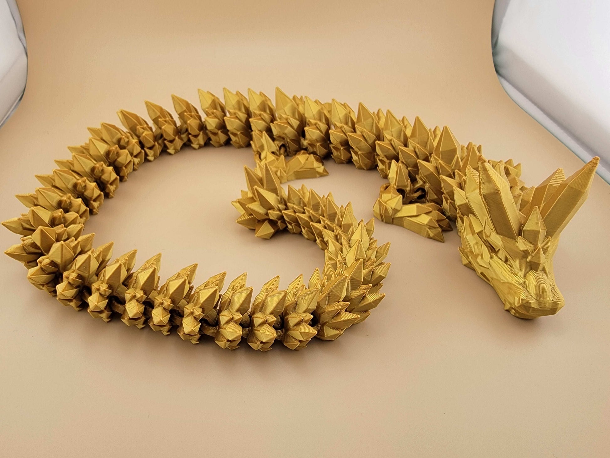 Golden Crystal Dragon layed out sleeping