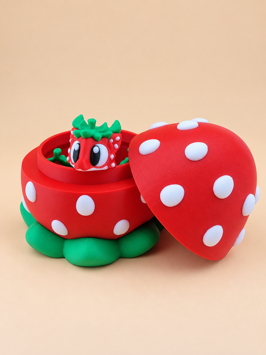 Strawberry Dragon nestled inside the open strawberry egg