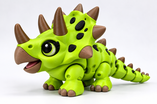 Green articulated 3D printed Triceratops dinosaur – three-quarter view