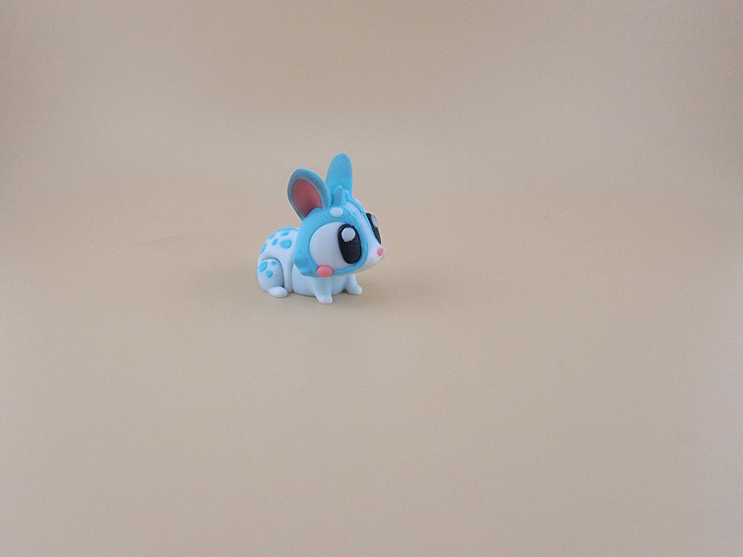 White with blue spots bunny flexi 3d printed easter basket idea